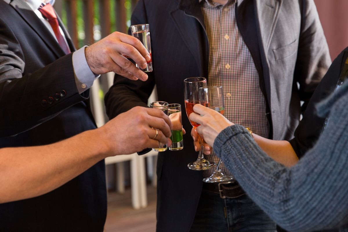 Hands holding glasses and toasting, happy festive moment, luxury celebration concept